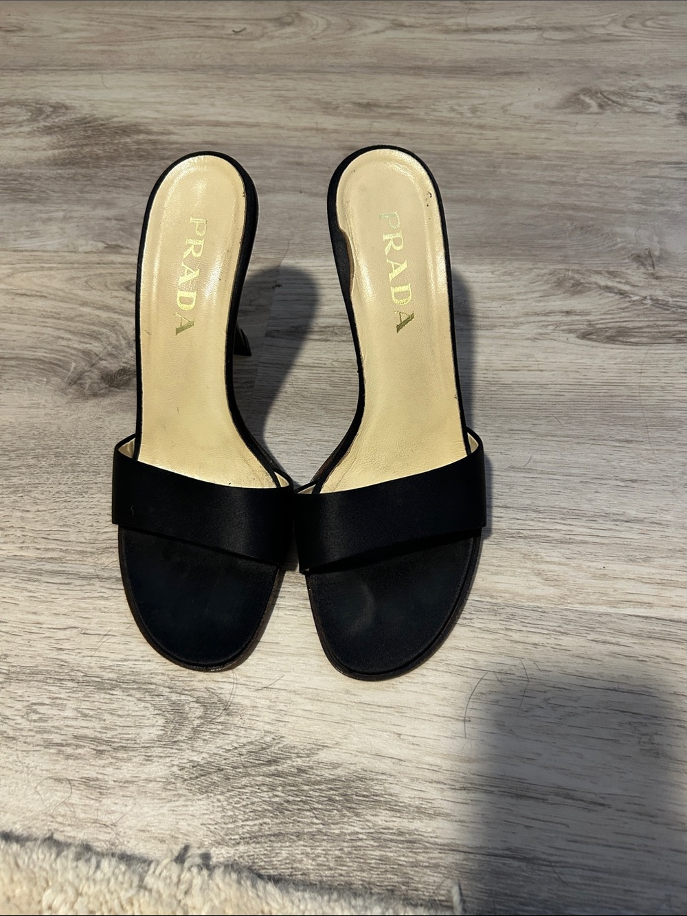 Prada Black Heels with Cream Insole and Gold Logo